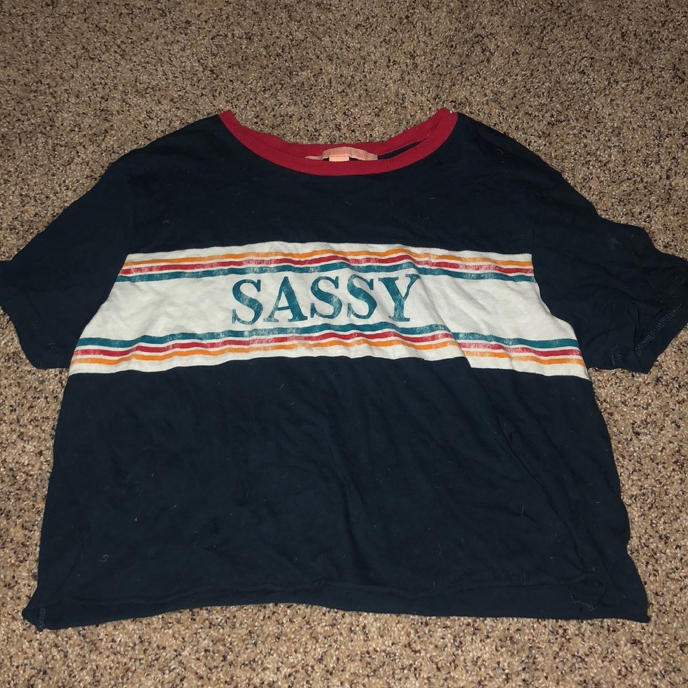 navy blue crop top with the word sassy on it.